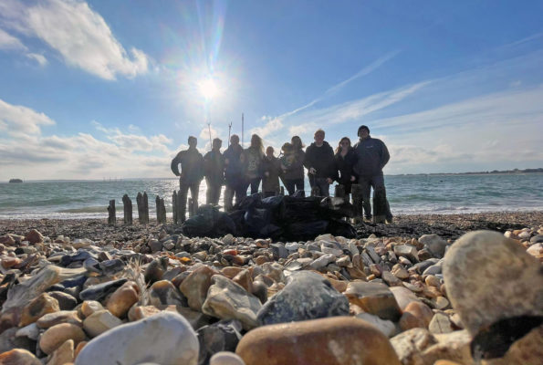 Southsea beach clean giganet community team stood on beach