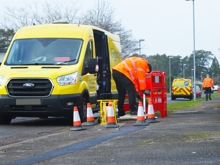 Yellow Giganet van parked on road in Ferndown where Giganet are installing full fibre in Dorset