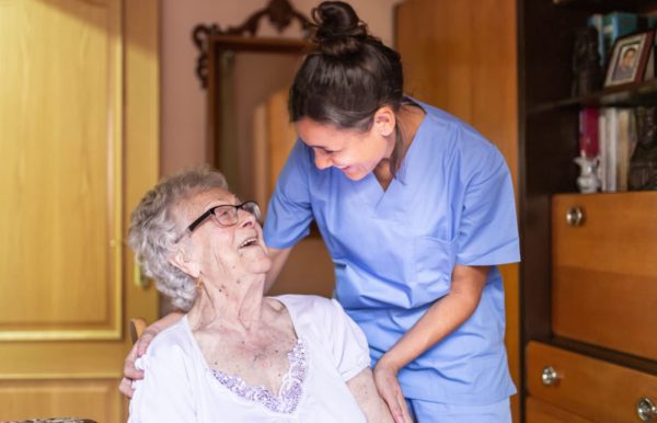 Care home staff helping residents using Giganet leased lines